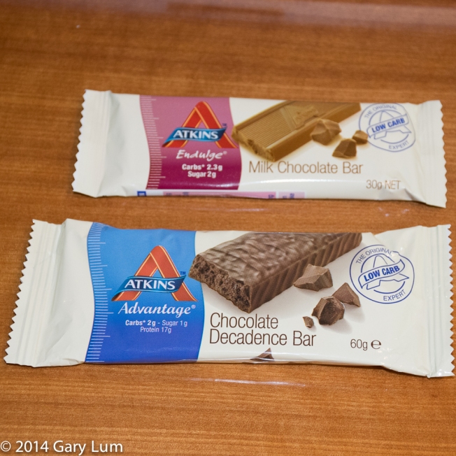 Thursday 2014-01-23 12.40.38-2 AEDT Atkins bars. I have mixed feelings about these bars. I don't want to become reliant on a sweet treat when the food cravings are satisfied with protein. They're also processed and for all I know contain gums and other things that are not nutritionally beneficial.